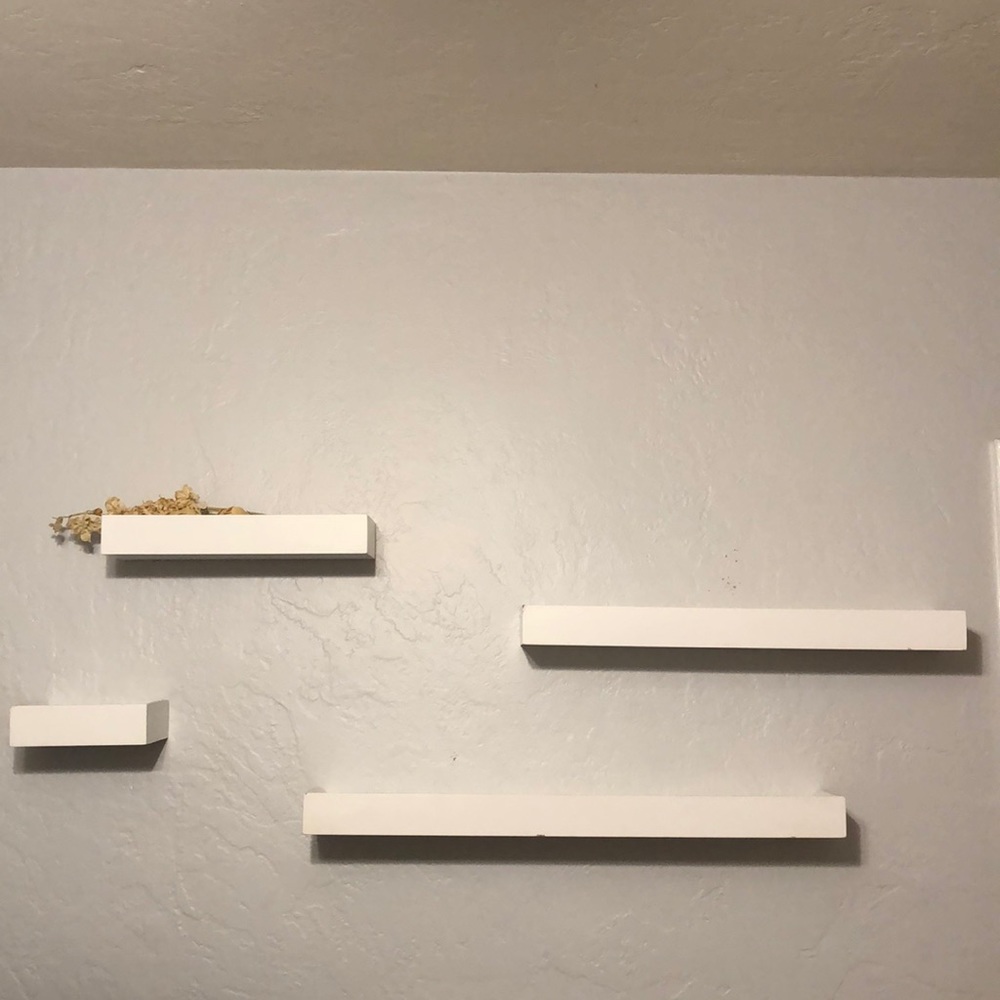 4 white shelves